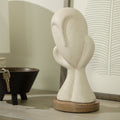 Sculpture de visage ensorcelant blanc