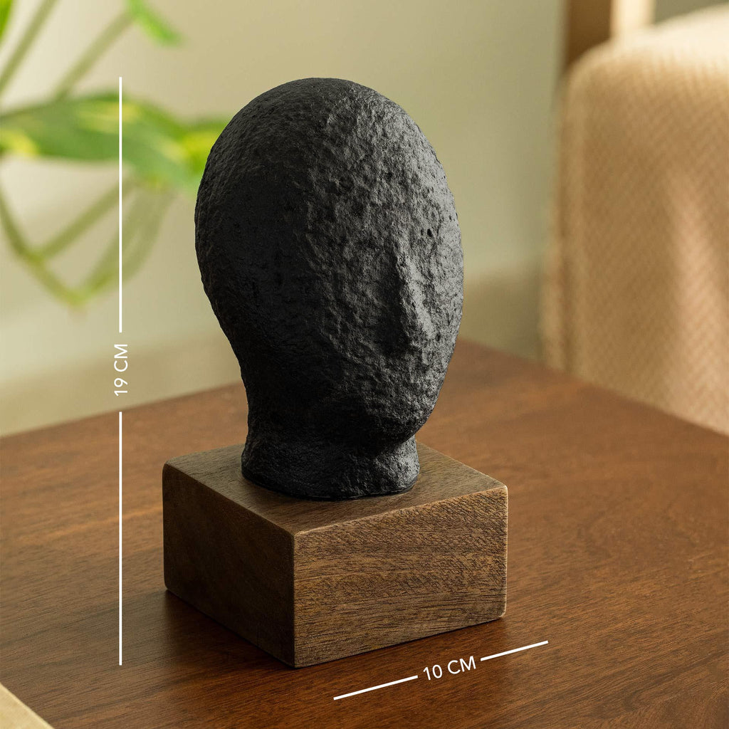 Sculpture visage calme noir