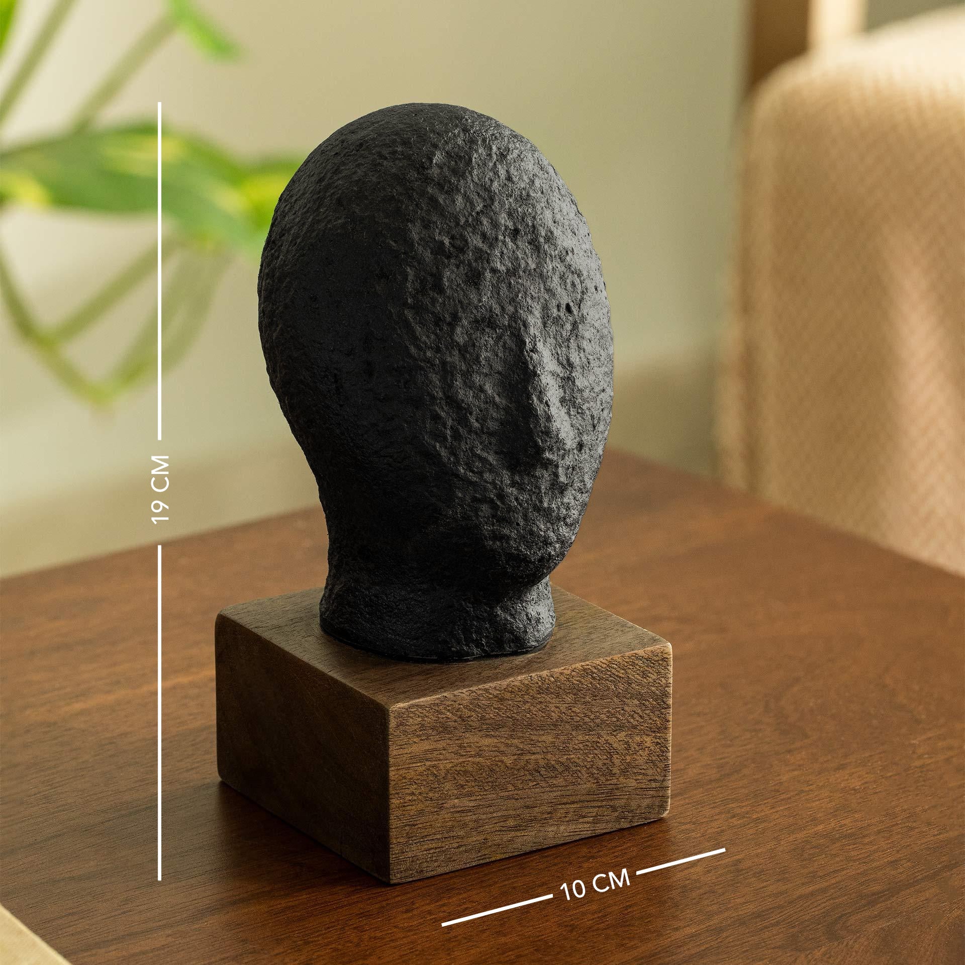 Sculpture visage calme noir