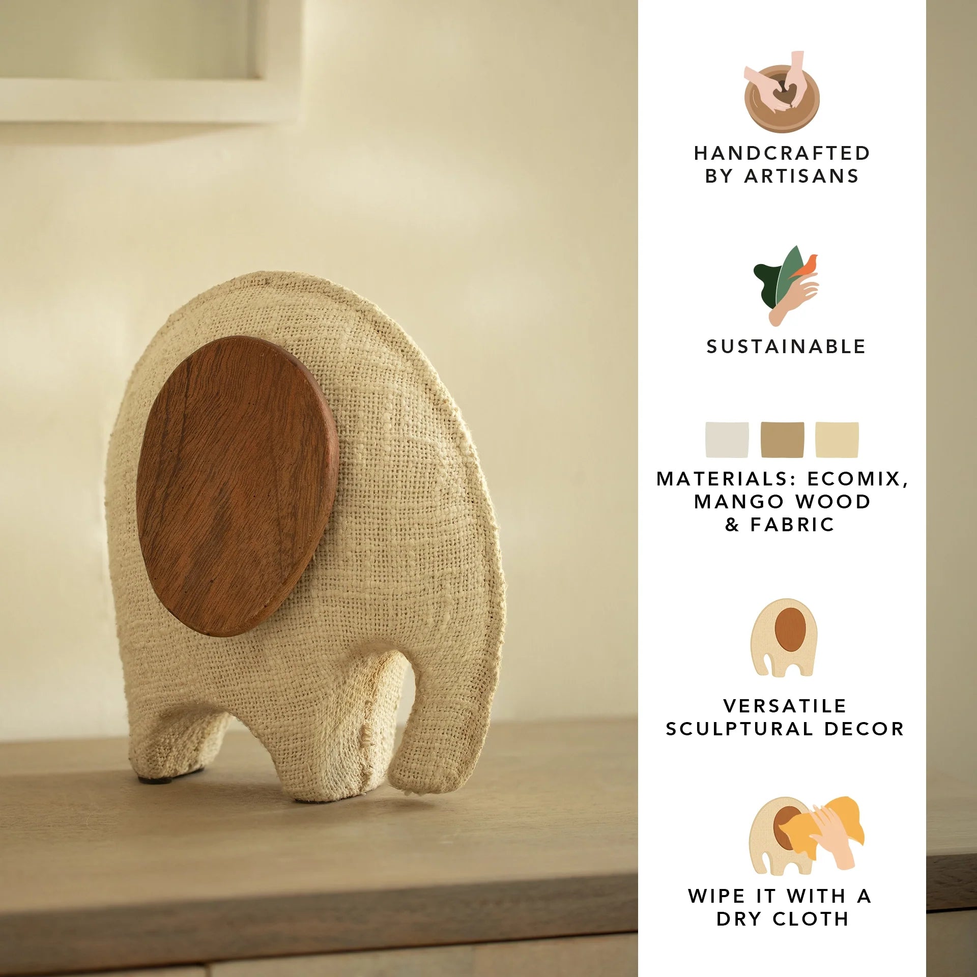 Petite sculpture d'éléphant avec des oreilles en bois